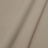 Fabric swatch of a plain stain resistant velvet upholstery fabric in a cream colour
