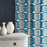 Patterned velvet curtains featuring a fun, jazzy pattern in blue, green and pink.