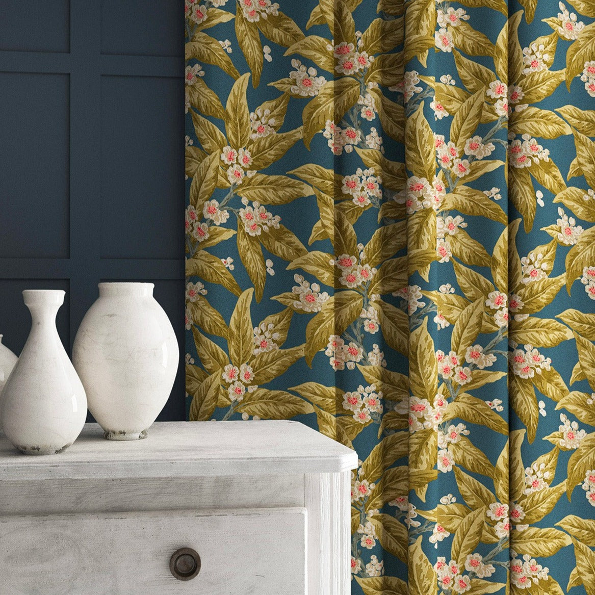Curtain in a dark blue velvet fabric with ochre leaves and pretty flowers.