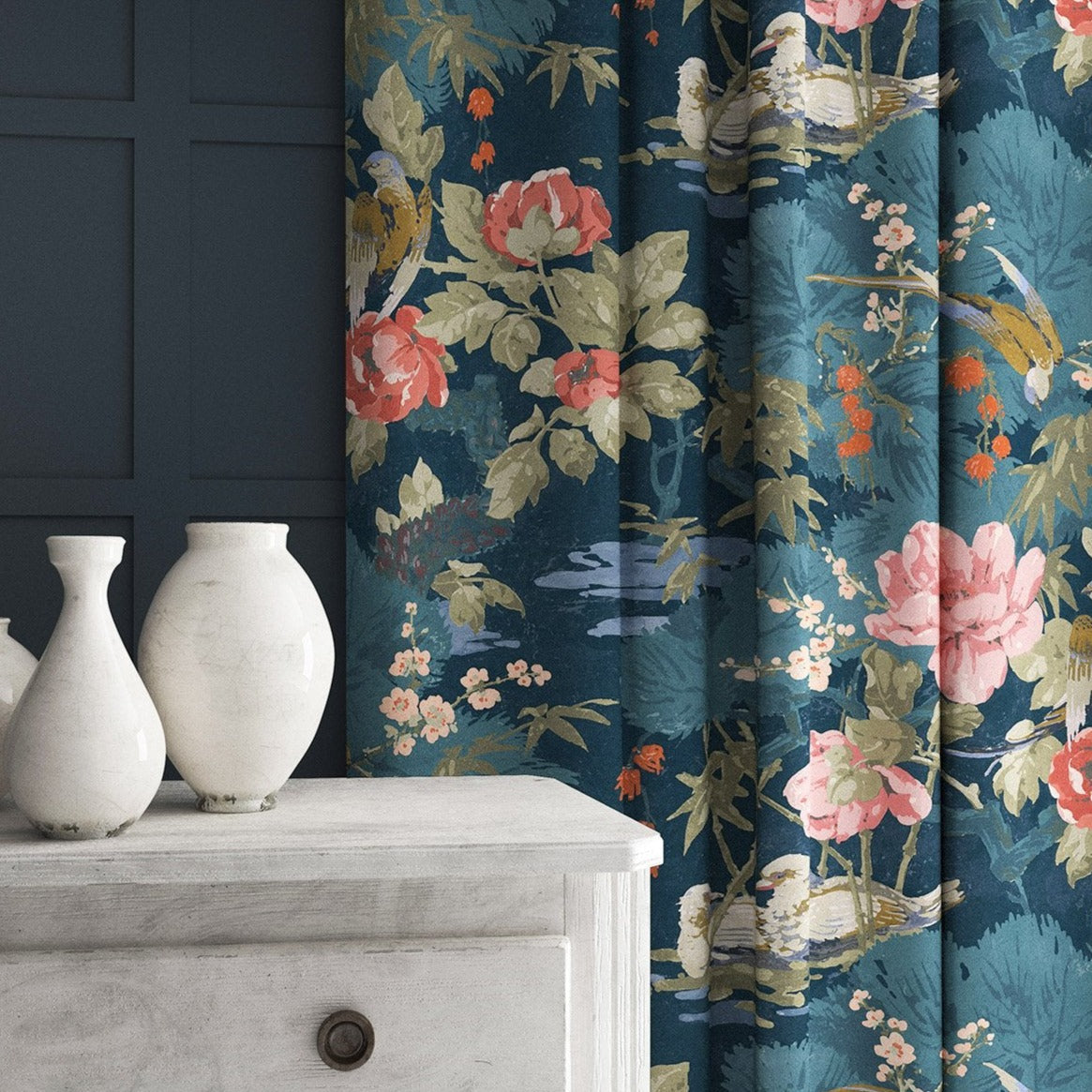 Velvet curtains in a blue-coloured floral pattern.