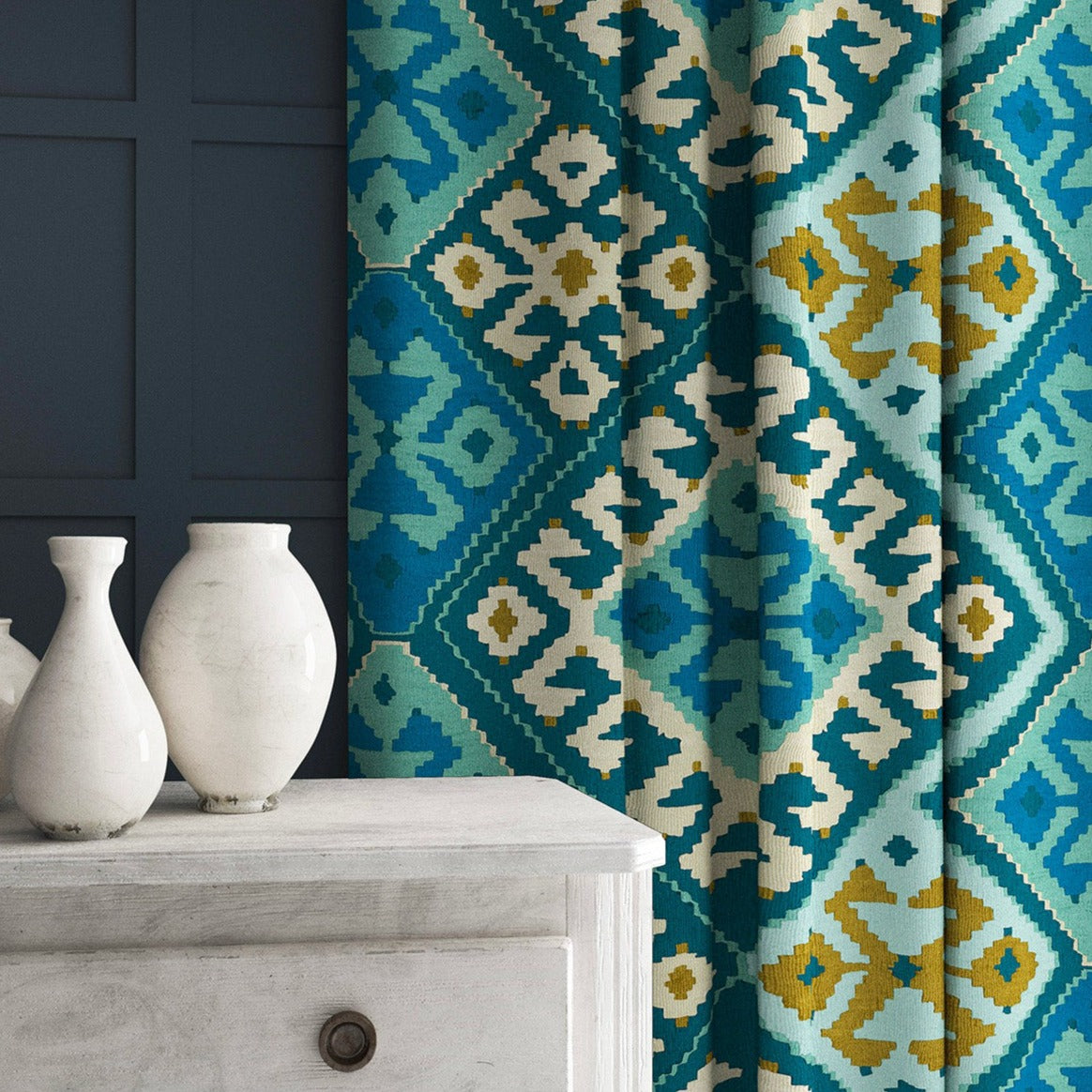 Velvet curtains in a blue kilim pattern.