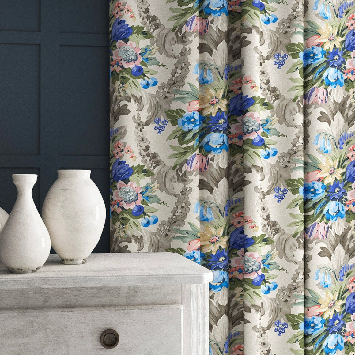 Curtains in a velvet fabric with blue and peach floral bouquet and stain resistant finish